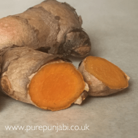 Fresh turmeric root and it's uses